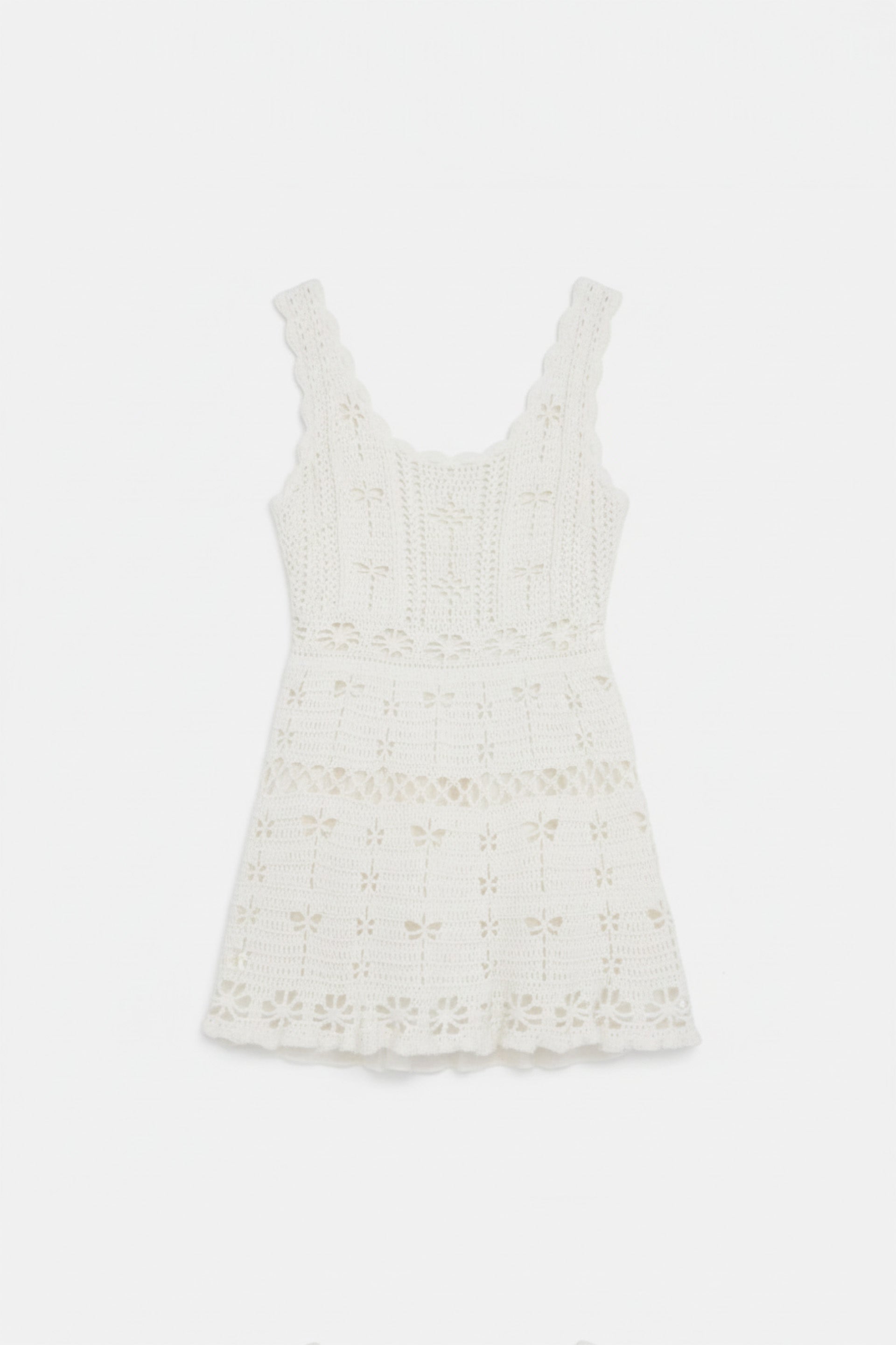White lace dress on a white background